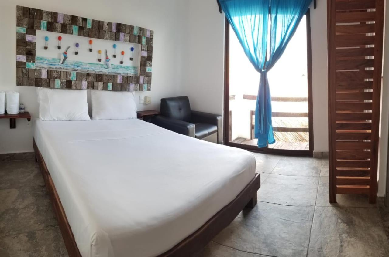 Hotel Blue Reef Frente Al Mar Mahahual Bagian luar foto